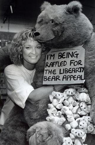 Grin and bear it: Gillian Taylforth, who played Kathy Beale, at a charity event in Borehamwood in 1992