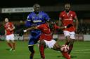 Femi Ilesanmi in action for York City against Adebayo Akinfenwa. Picture: Action Images
