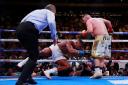 Anthony Joshua is knocked to the ground by Andy Ruiz Jr. Picture: Action Images