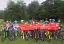 Some of the pupils at Edge Grove who took part in the sponsored cycling event