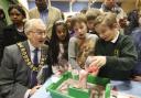 Pupils show off their newfound science skills to Mayor Clive Butchins