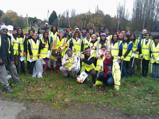 Volunteers from Bhaktivedanta Manor gather to pick up litter in Maxwell Hillside Park and Parkfields in Borehamwood

