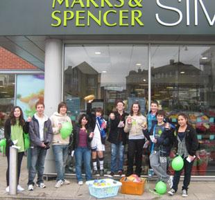 Children from the religion school at Southgate Progressive Synagogue collect non-perishable items for the homeless in Barnet, outside Marks & Spencer in Southgate 