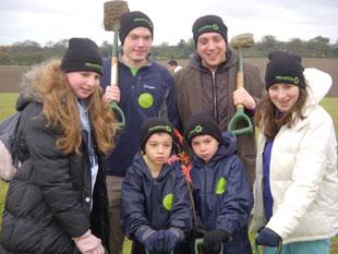 Members of Borehamwood and Elstree United Synagogue help plant trees in Heartwood Forest, St Albans.
