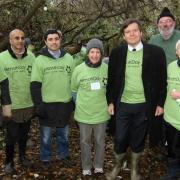 Young and old unite to clean up field for Mitzvah Day
