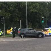 Armed police by the A414 roundabout by the London Colney bypass.