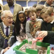 Pupils show off their newfound science skills to Mayor Clive Butchins