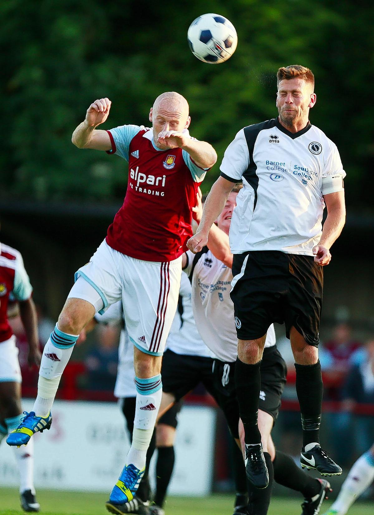 Excellent goalkeeping by Boreham Wood's Mark Russell could not stop West Ham romping to a 3-0 victory as the two sides played their annual pre-season friendly.