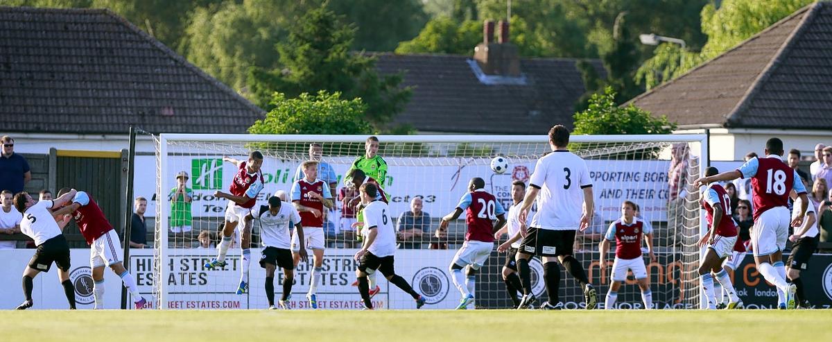 Excellent goalkeeping by Boreham Wood's Mark Russell could not stop West Ham romping to a 3-0 victory as the two sides played their annual pre-season friendly.