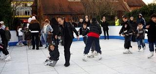 Children enjoy skating outside All Saints Church