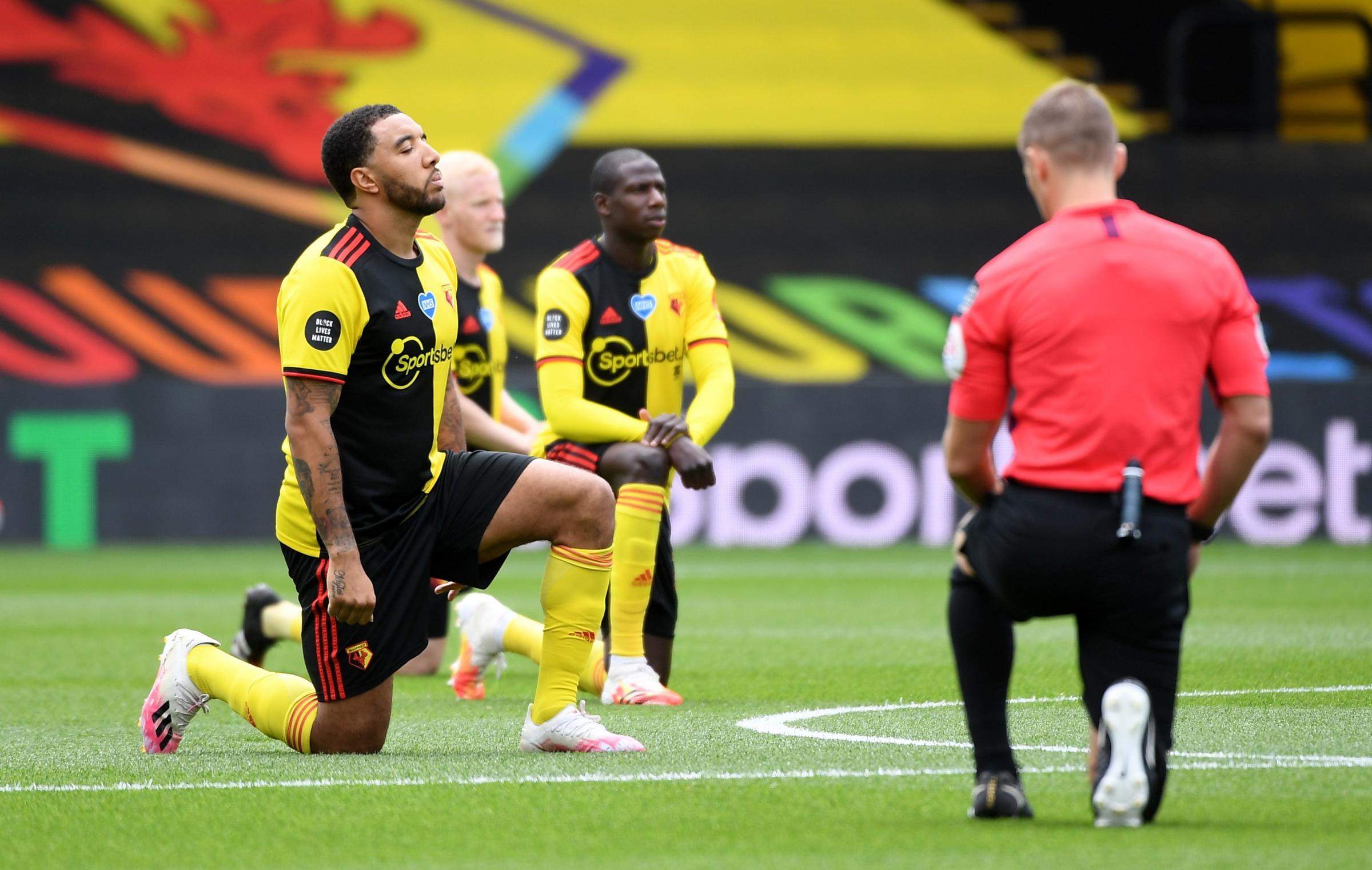 Soccer Football - Premier League - Watford v Leicester City - Vicarage Road, Watford, Britain - June 20, 2020 Watfords Troy Deeney kneels in support of the Black Lives Matter campaign before the match, as play resumes behind closed doors following the