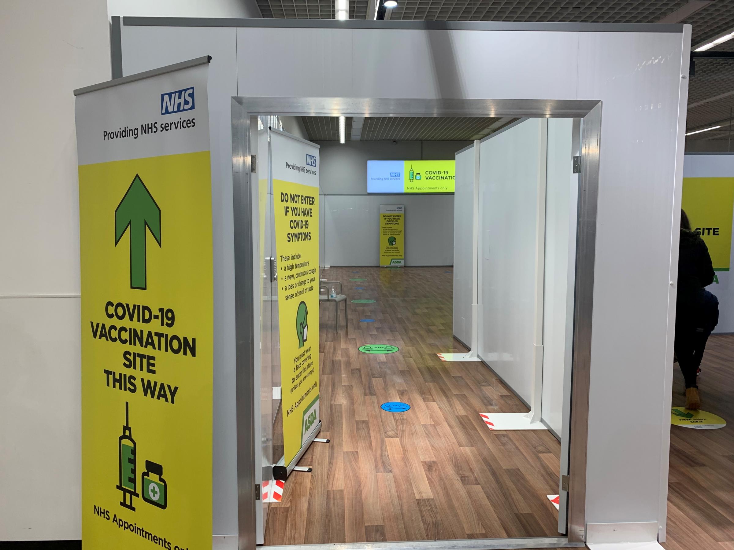 The entrance to the Covid vaccination centre inside Asda Watford. Credit: PA