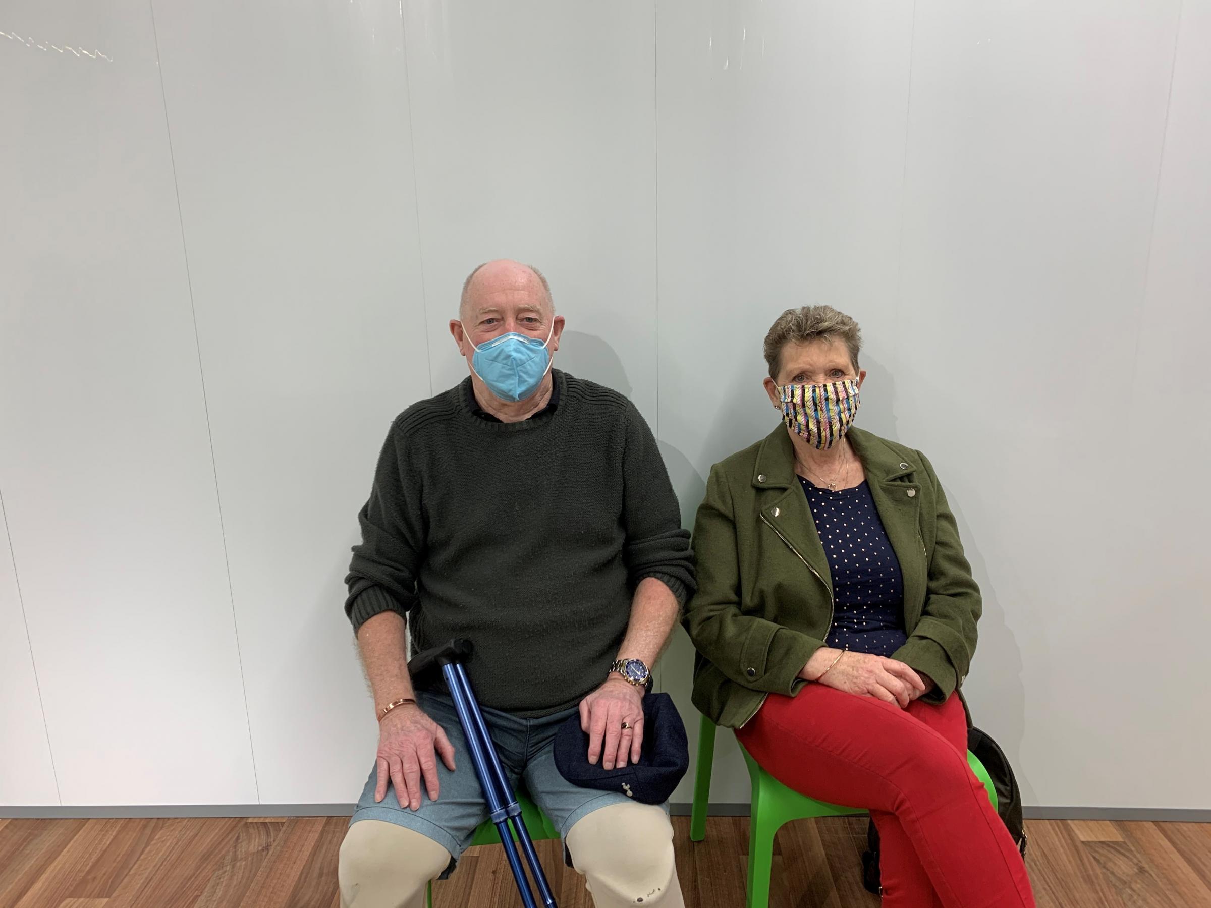 Phil and Maria from Berkhamsted travelled from Watford for their Covid vaccination centre. They are pictured in the observation room.
