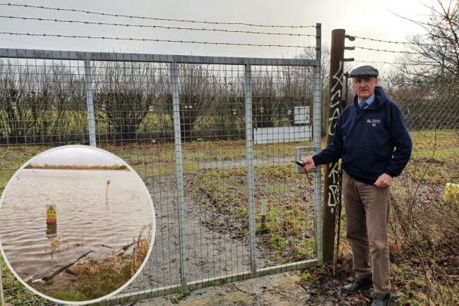 Richard Jenkins, new Commodore at Aldenham Sailing Club, at the gate of the storage compound which has now been handed back to Hertfordshire County Council