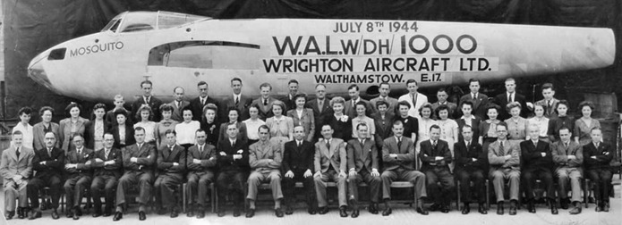 The Mosquito build team at Wrighton Aircraft in Walthamstow, proudly pose next to the 1,000th Mosquito fuselage built at the factory