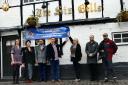 Landlords and CAMRA pictured with Anne Main outside The Six Bells. Picture: Eat Life Productions - Ruth Tidmarsh