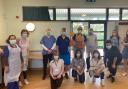 Staff and volunteers from the Allum Hall vaccination centre