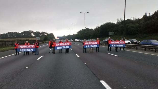 Insulate Britain protesters on the M25 in September