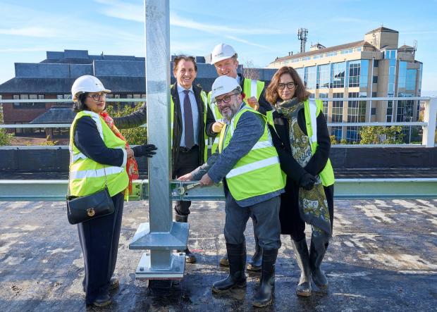 Borehamwood Times: left to rightL Sajida Bijle (Managing Director of Hertsmere Borough Council), Nigel Wilson (CEO, Legal & General Group) Cllr. Morris Bright MBE (Leader of Hertsmere Borough Council) Rt. Hon Oliver Dowden (MP) Cécile Frot-Coutaz (CEO Sky Studios) at the topping out ceremony. Credit: Keith Armstrong for Sky Studios