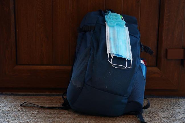 A student's bag and mask