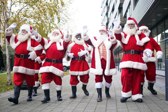 Santa students from the annual Santa school return for in-person training at the Ministry of Fun’s Santa School in London (Yui Mok/PA)