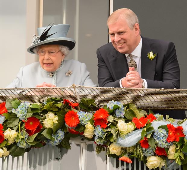 Borehamwood Times: (left to right) Queen Elizabeth II and Prince Andrew. Credit: PA