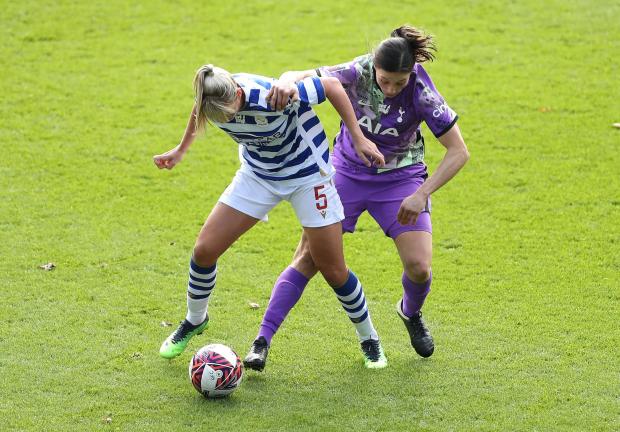 Borehamwood Times: Reading's Gemma Evans (left) and Tottenham Hotspur's Rachel Williams battle for the ball during the Barclays FA Women's Super League match at the Select Car Leasing Stadium, Reading. Photo via PA/Bradley Collyer.