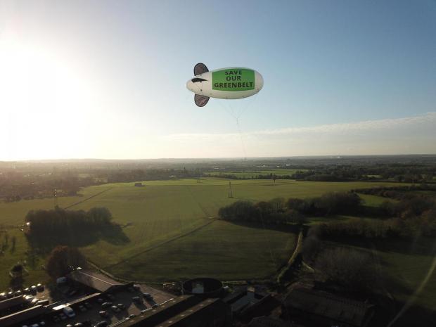 Borehamwood Times: A blimp over Hertsmere that says 'save our green belt'. Credit: Save Radlett Campaign Group