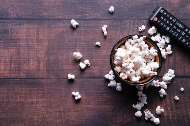 Borehamwood Times: A bowl of popcorn and a TV remote (Canva)