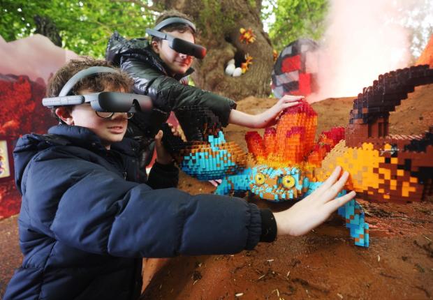 Borehamwood Times: Lucca and Sonny using the eSight eyewear as they explored the Magical Forest (LEGOLAND Windsor)