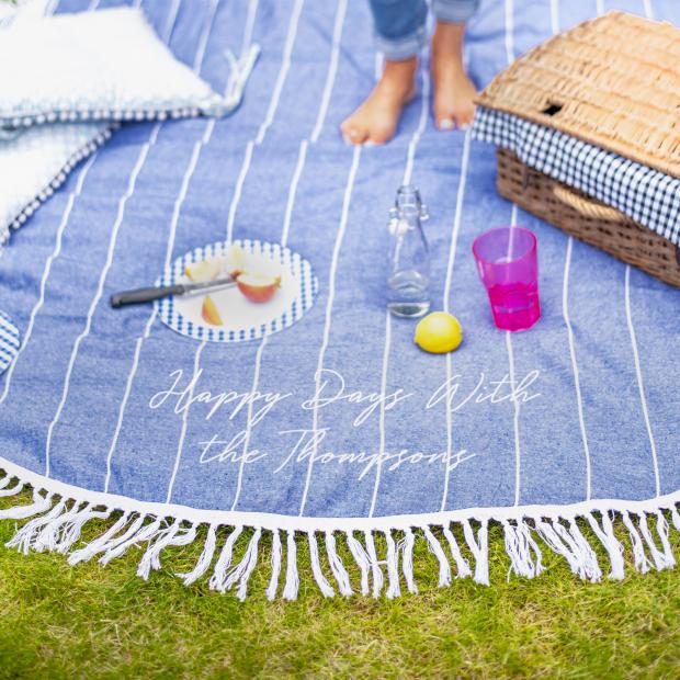 Borehamwood Times: Personalised Round Blue Picnic Or Beach Blanket. Credit: Not On The High Street