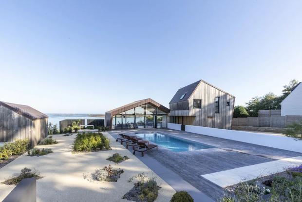 Borehamwood Times: Modern villa with stunning sea views, swimming pool, Jaccuzi - Brittany, France. Credit: Vrbo