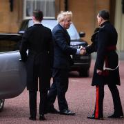 Prime Minister Boris Johnson arrives at London's Buckingham Palace for an audience with Queen Elizabeth II after the Conservative Party was returned to power in the General Election with an increased majority. PA Photo. Picture date: Friday December