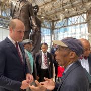 Siggy Cragwell speaks to Prince William at the unveiling of the National Windrush Monument