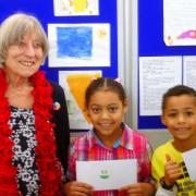 Ann Goddard with the art competition winners. Photo: Pat O'Donnell