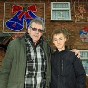Mr Press with his grandson, Ross, who helped erect the lights