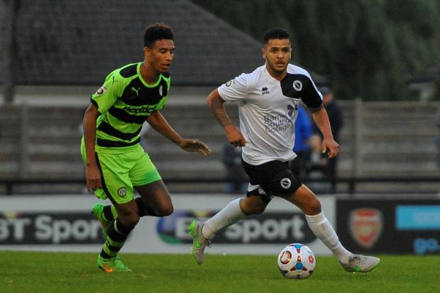 Borehamwood Times: Billy Clifford (right) gets past Kurtis Guthrie. Picture: Sean Hinks