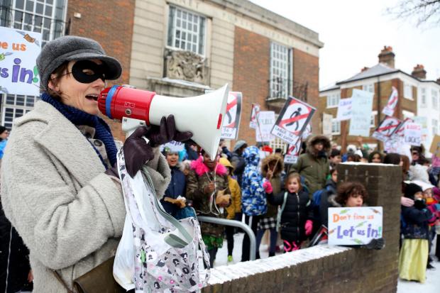 Children and parents protested in the snowy weather for more access to libraries (Photo: Holly Cant)